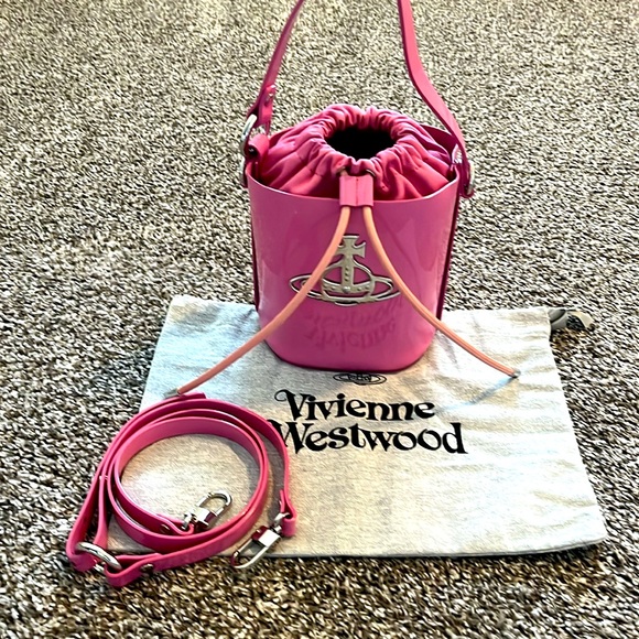 VIVIENNE WESTWOOD
Pink Daisy Drawstring Bucket Bag $600 NWT - Picture 4 of 6
